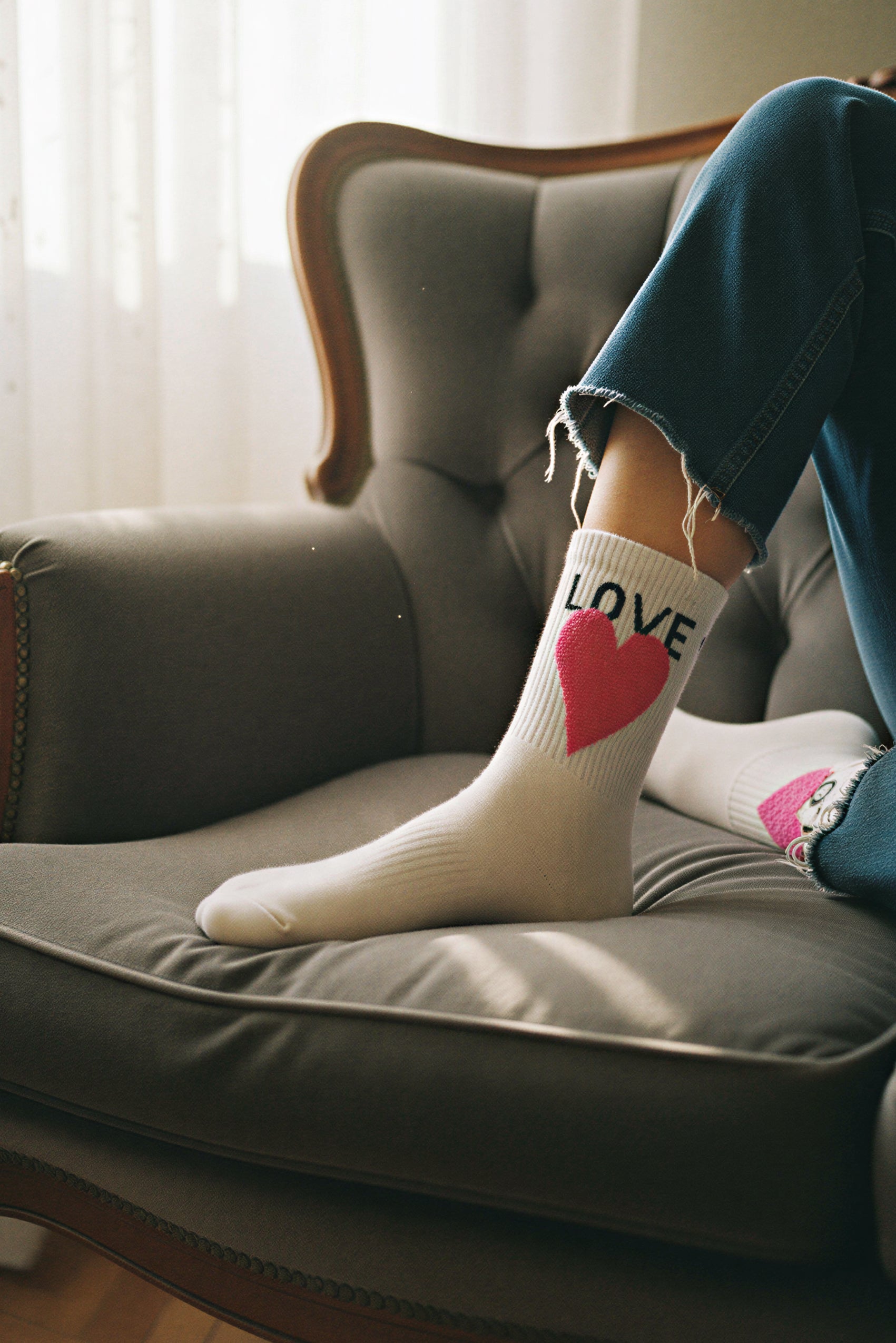 Socken mit Herz-Motiv in Weiß