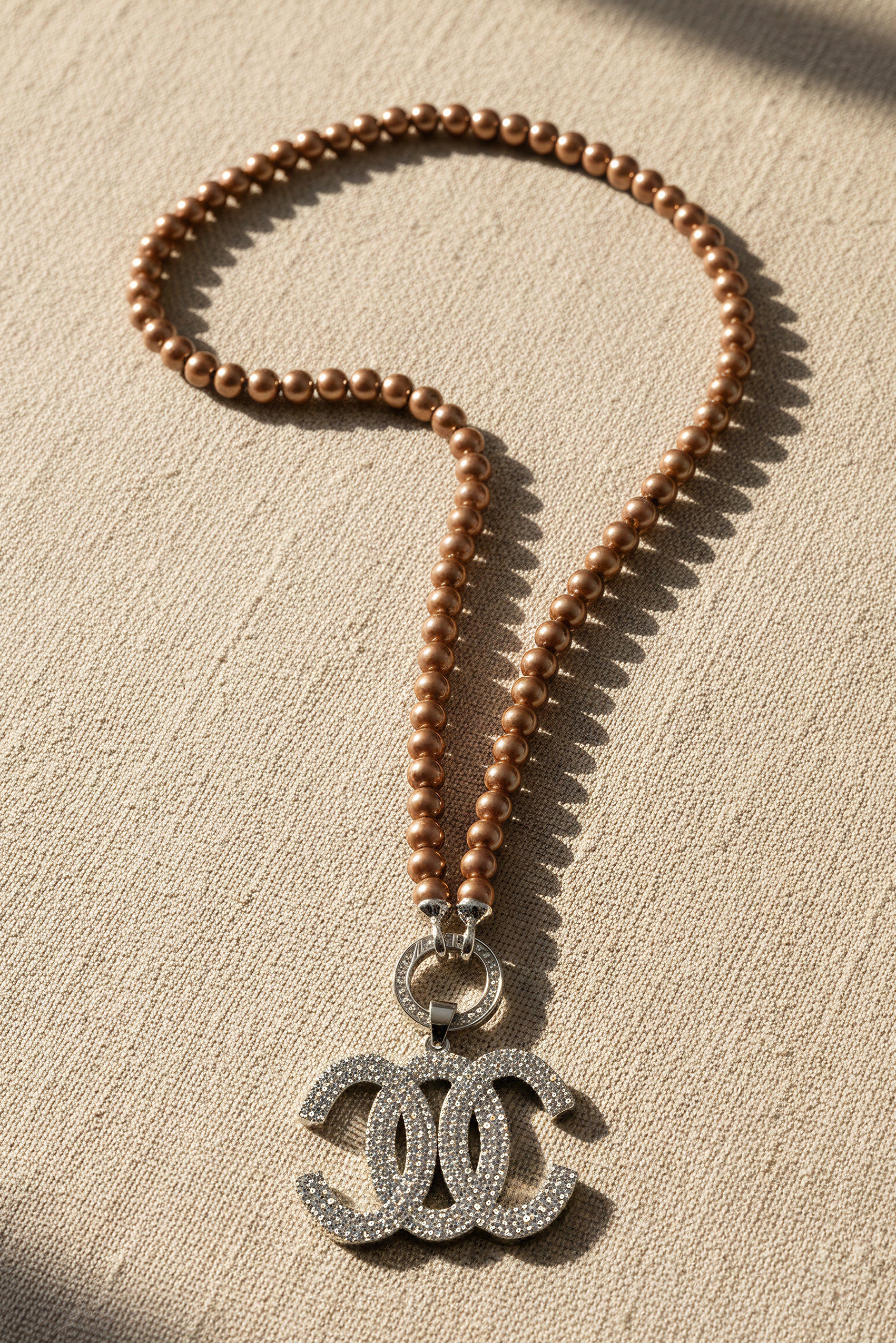 Bronze Perlenkette mit Anhänger mit Strasssteinen besetzt