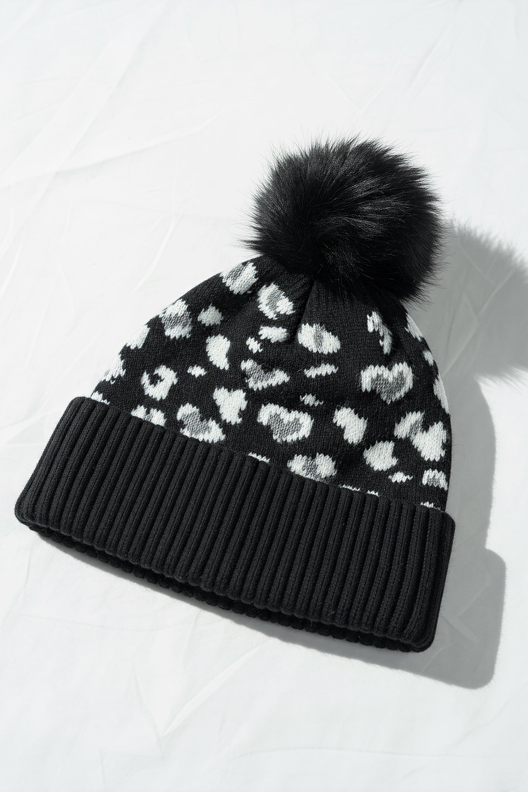 Mütze mit Leo-Muster, schwarz