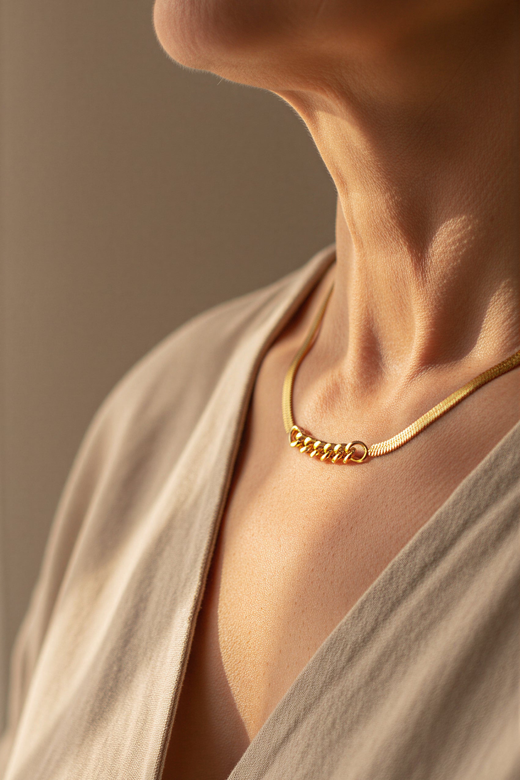 Kette Schlangenkette mit Ring-Elementen, gold