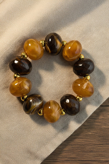 Armband mit Acryl-Perlen in Braun-Caramel mit Golddetails