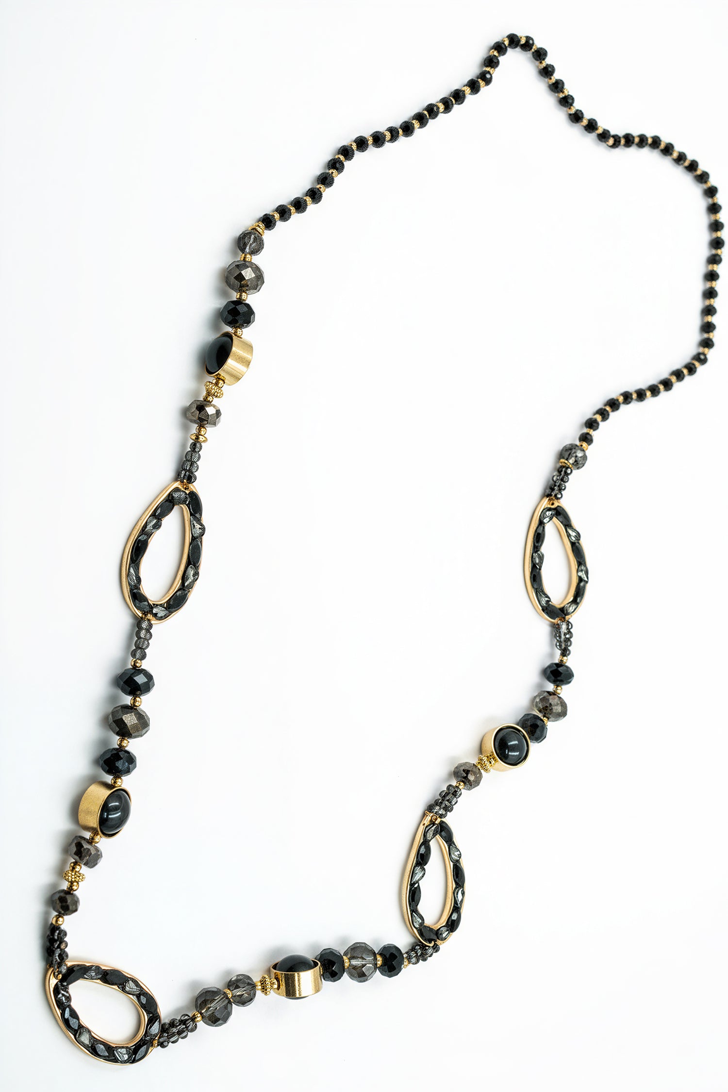 Elegante Gliederkette mit schwarzen Schmucksteinen und goldenen Oval-Elementen