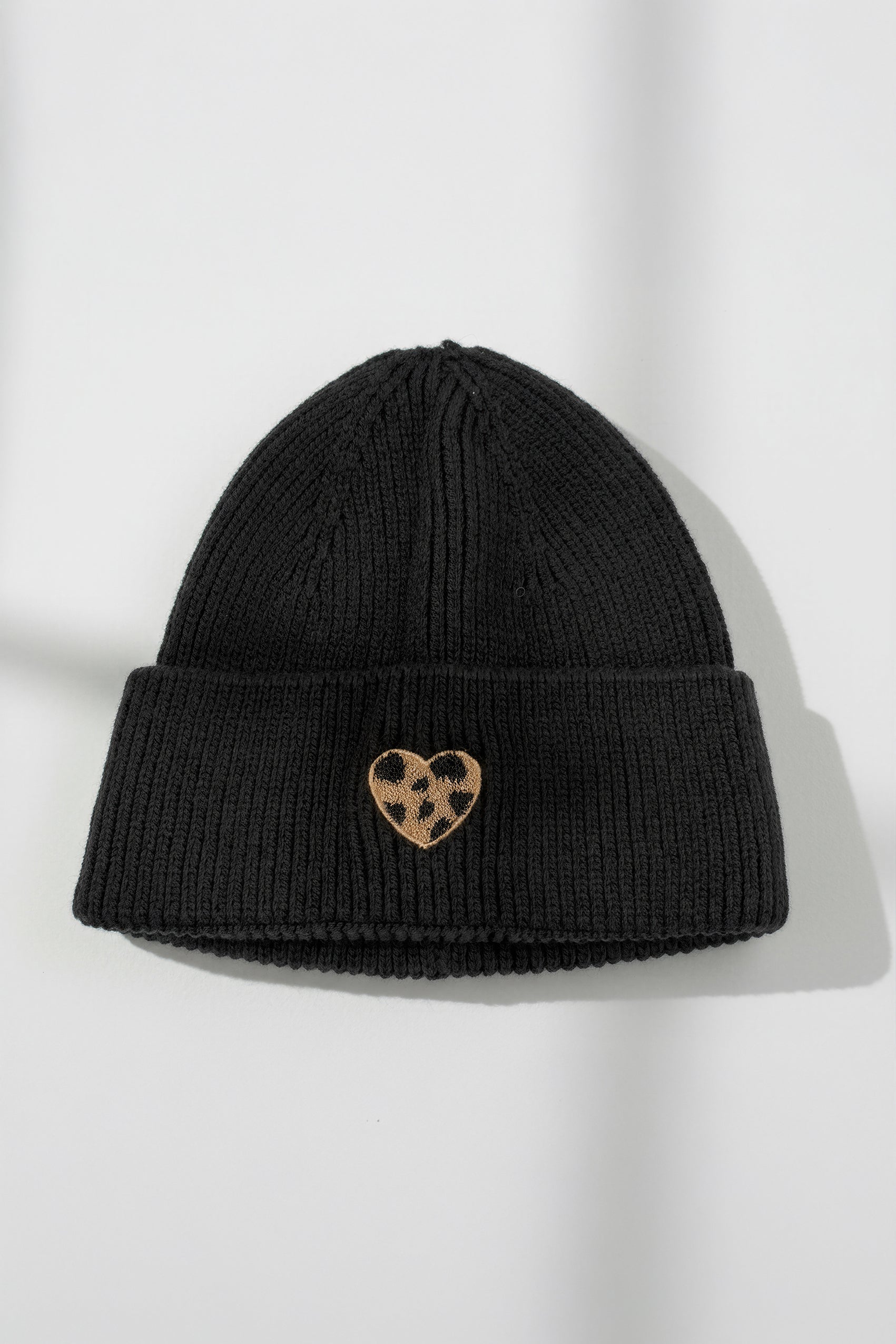 Mütze mit Leo-Herz, schwarz