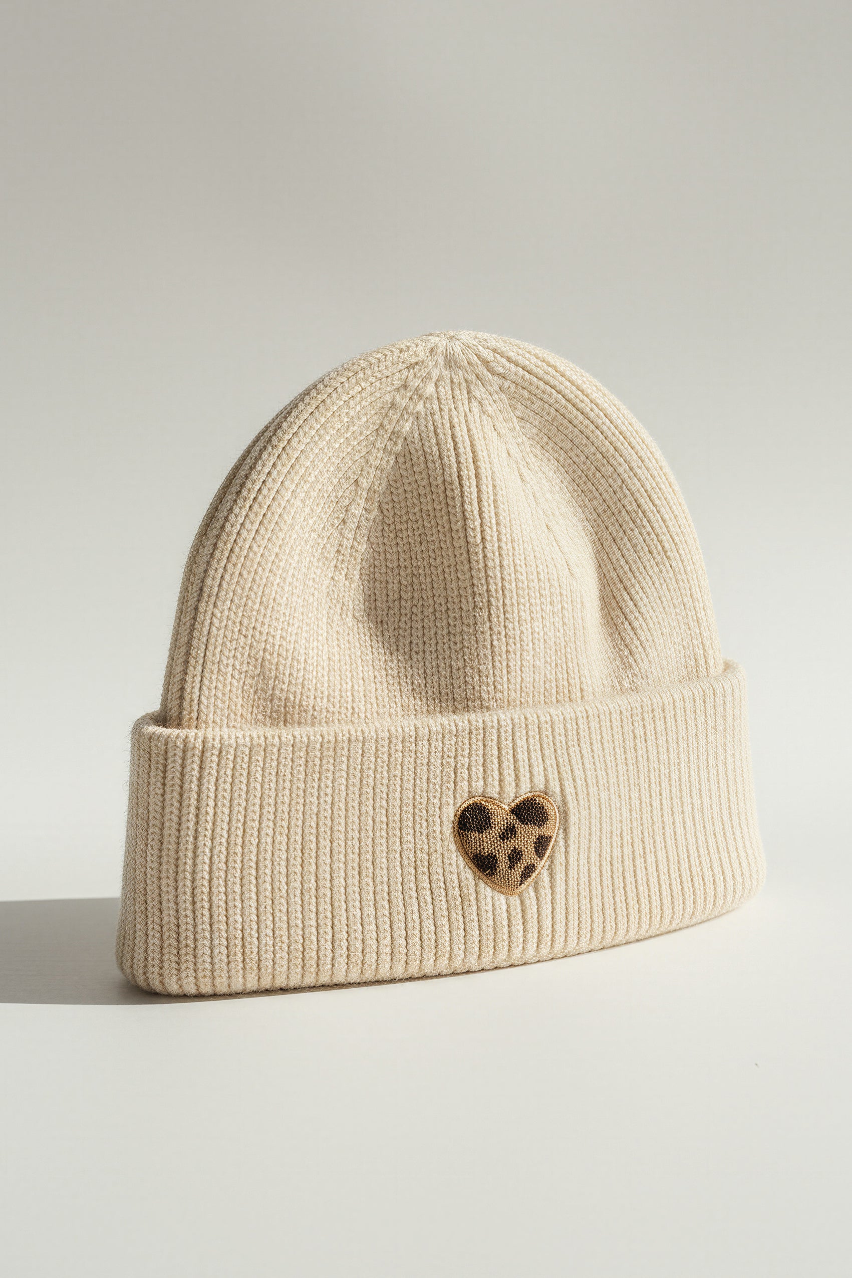 Mütze mit Leo-Herz, creme
