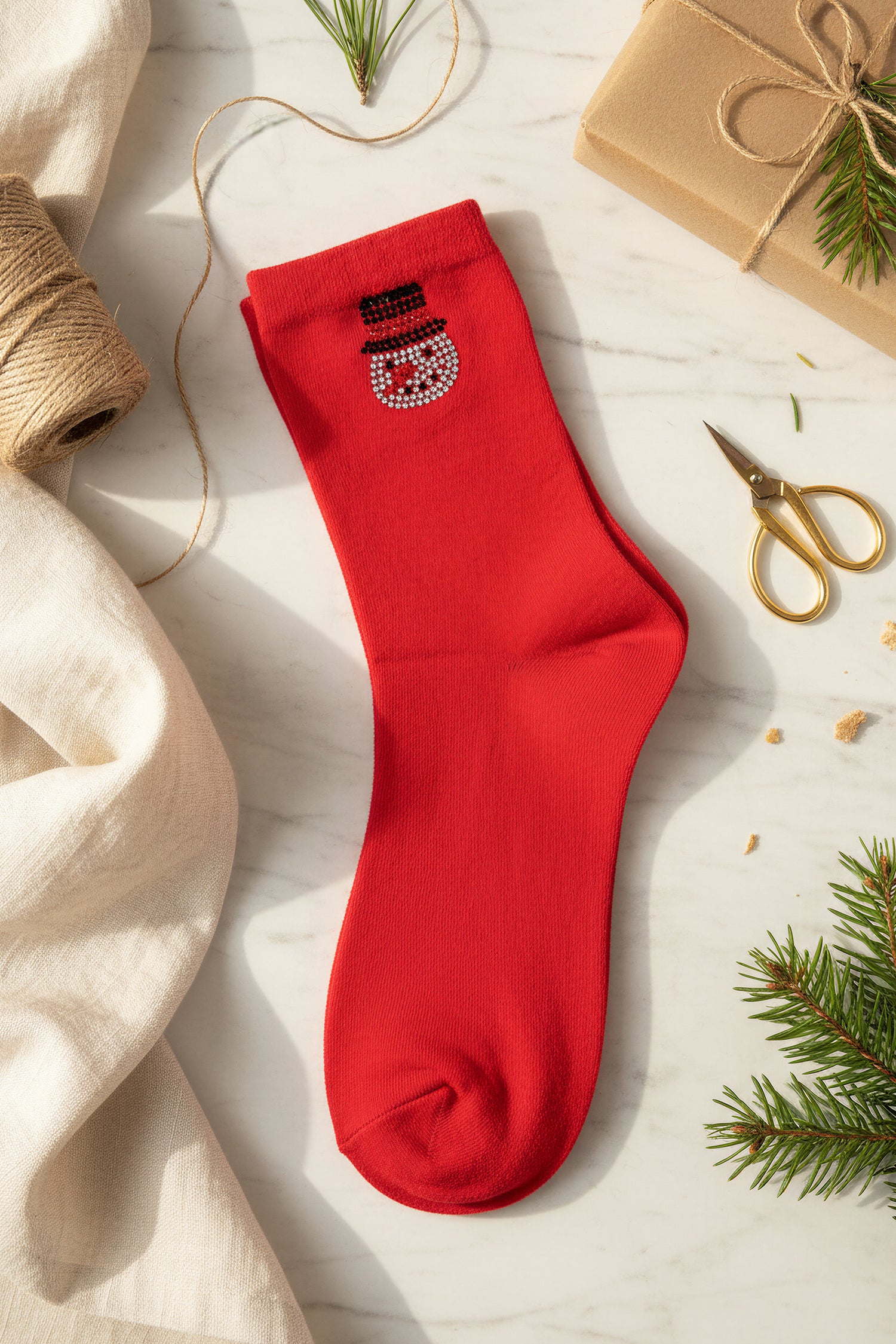 Socken mit Schneemann aus Strasssteinchen