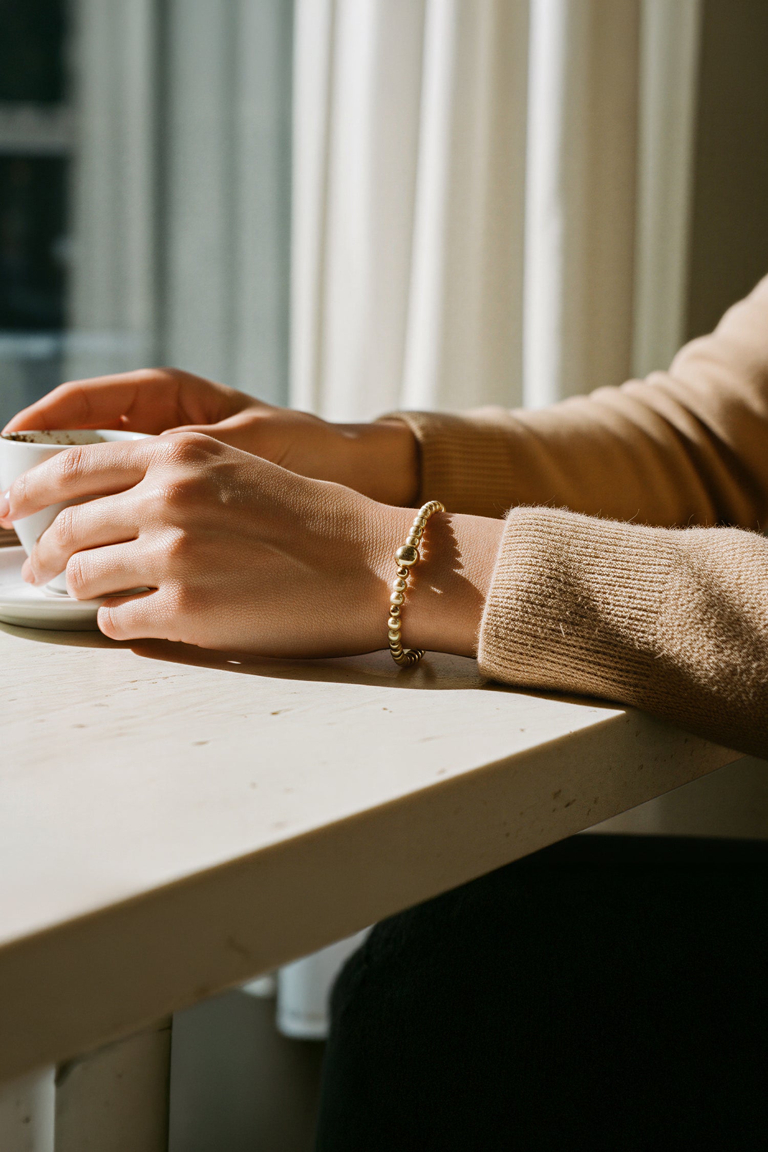 Perlenarmband, champagner und gold