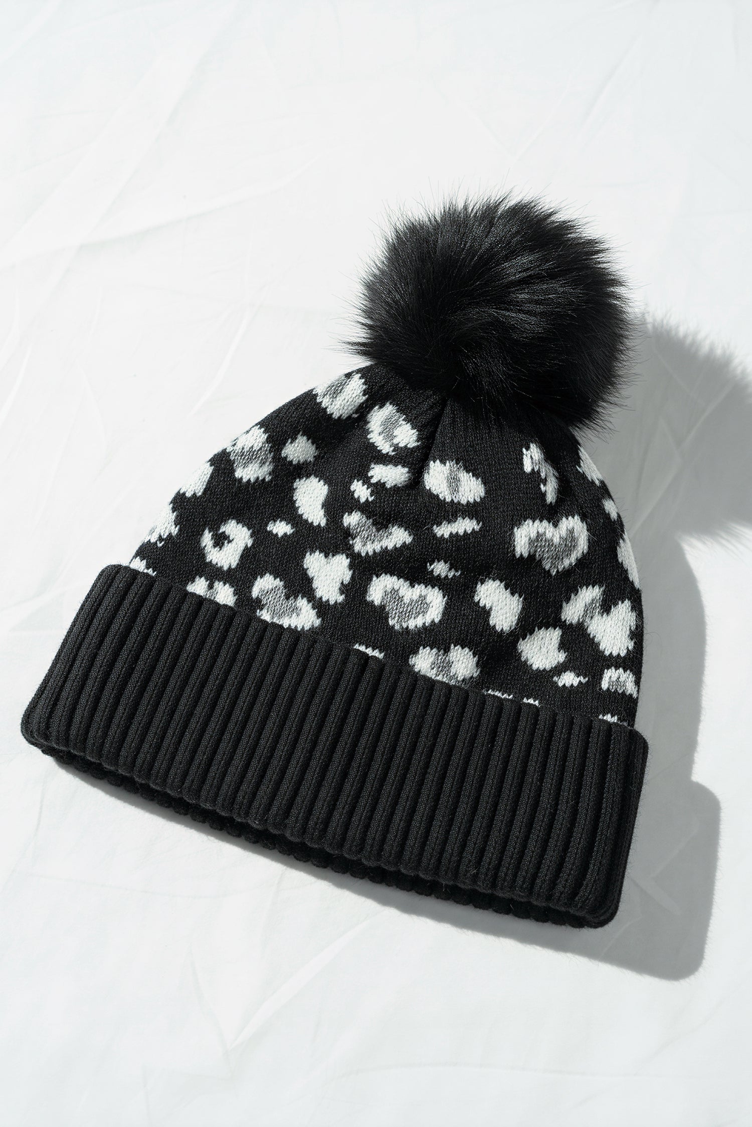 Mütze mit Leo-Muster, schwarz