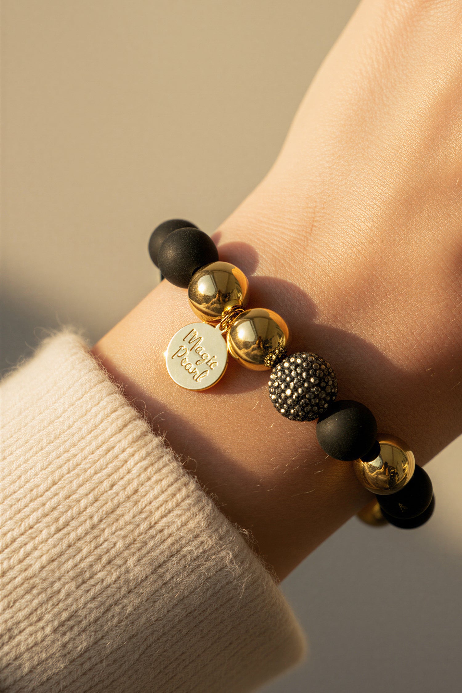 Perlenarmband Schwarz-Gold