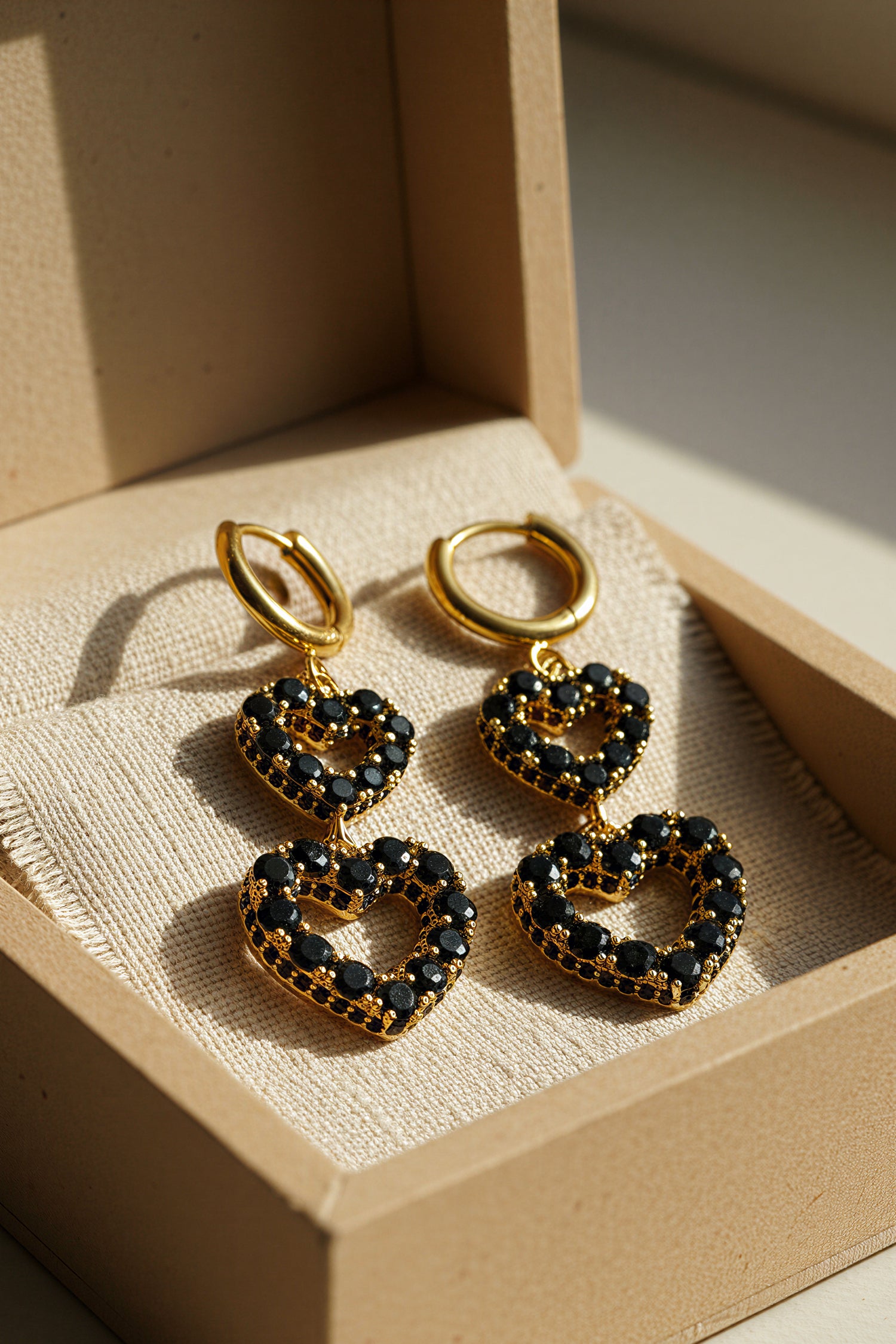 Creolen mit doppeltem Herzanhänger