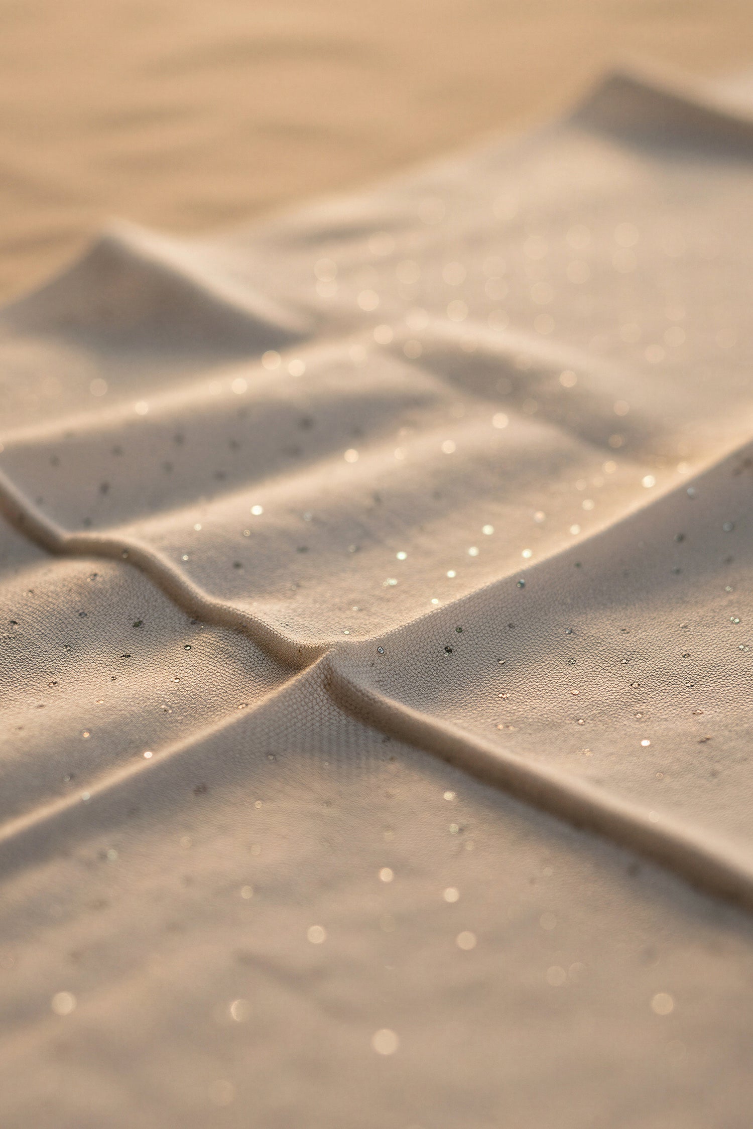 Schal in Creme mit Fransen und Strass-Details